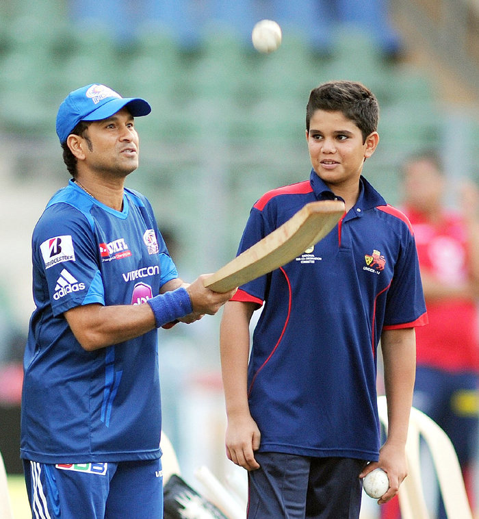Arjun Tendulkar with Sachin Tendulkar